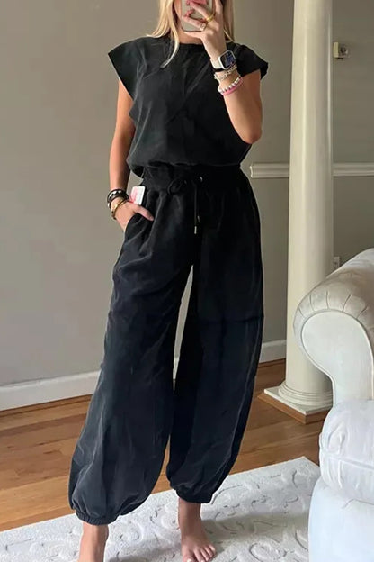 Casual Simplicity Solid Pocket Frenulum Backless O Neck Loose Jumpsuits
